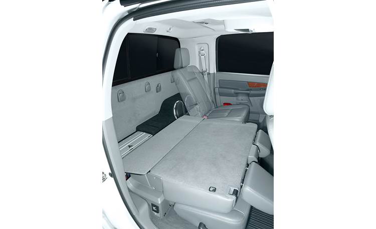 JL Audio Stealthbox® Custom-fit fiberglass enclosure with two 10" W6v3 subwoofers Fits 2006-up Dodge Ram Mega Cab